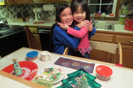 Kasen and Karis with Santa cookies
